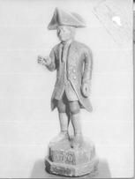SA0669 - Photo of a wood carving of a man from colonial times; the date 1770 is carved in the base. Of Shaker origin?